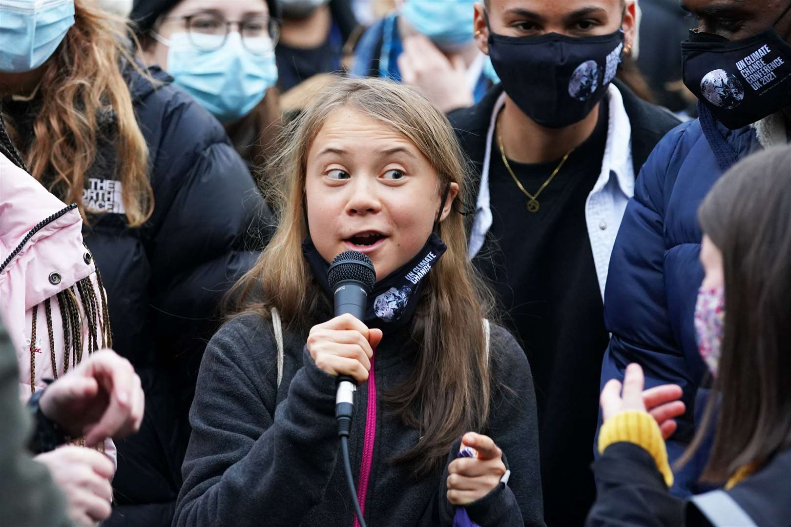 Greta Thunberg alongside fellow climate activists (Andrew Milligan/PA)