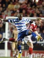 Ben Thatcher is beaten in the air by Leroy Lita. Picture: MATT WALKER