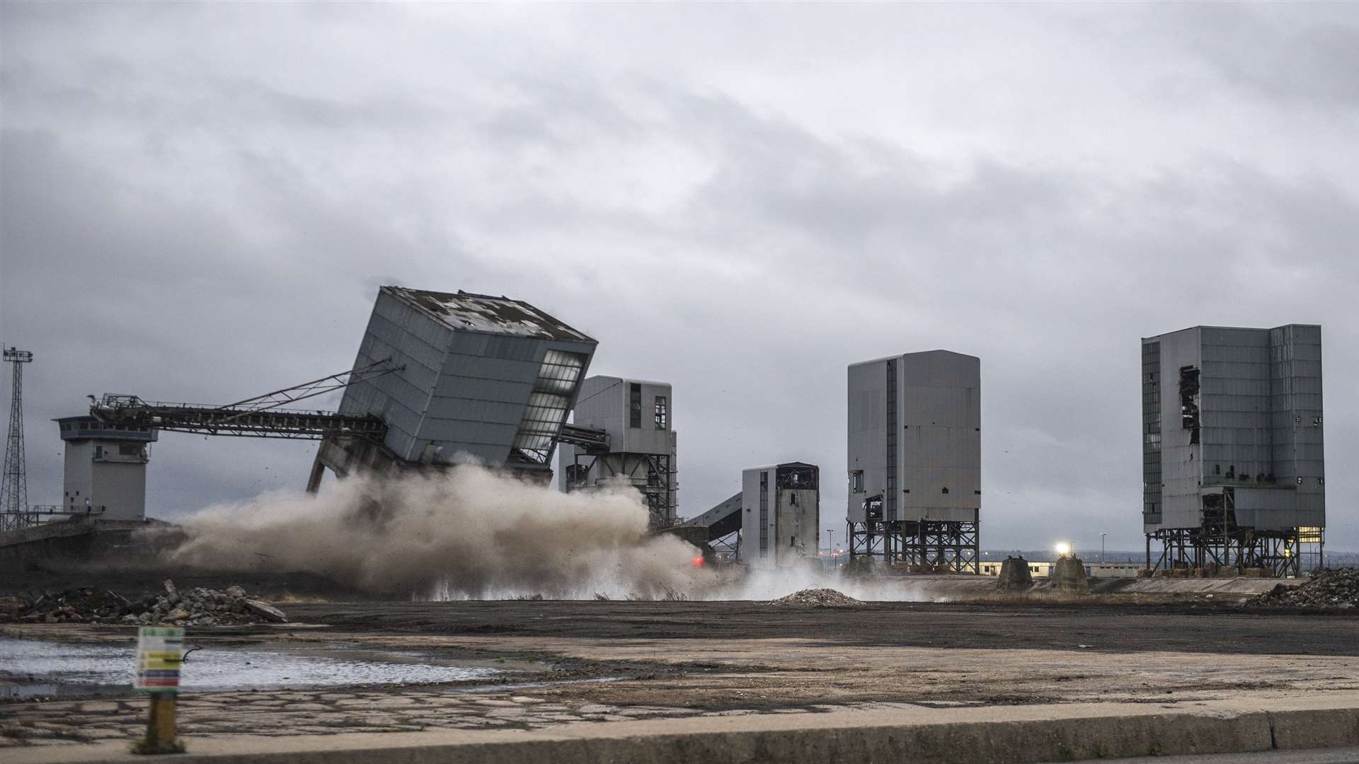 The building starts to come down with an almighty crash