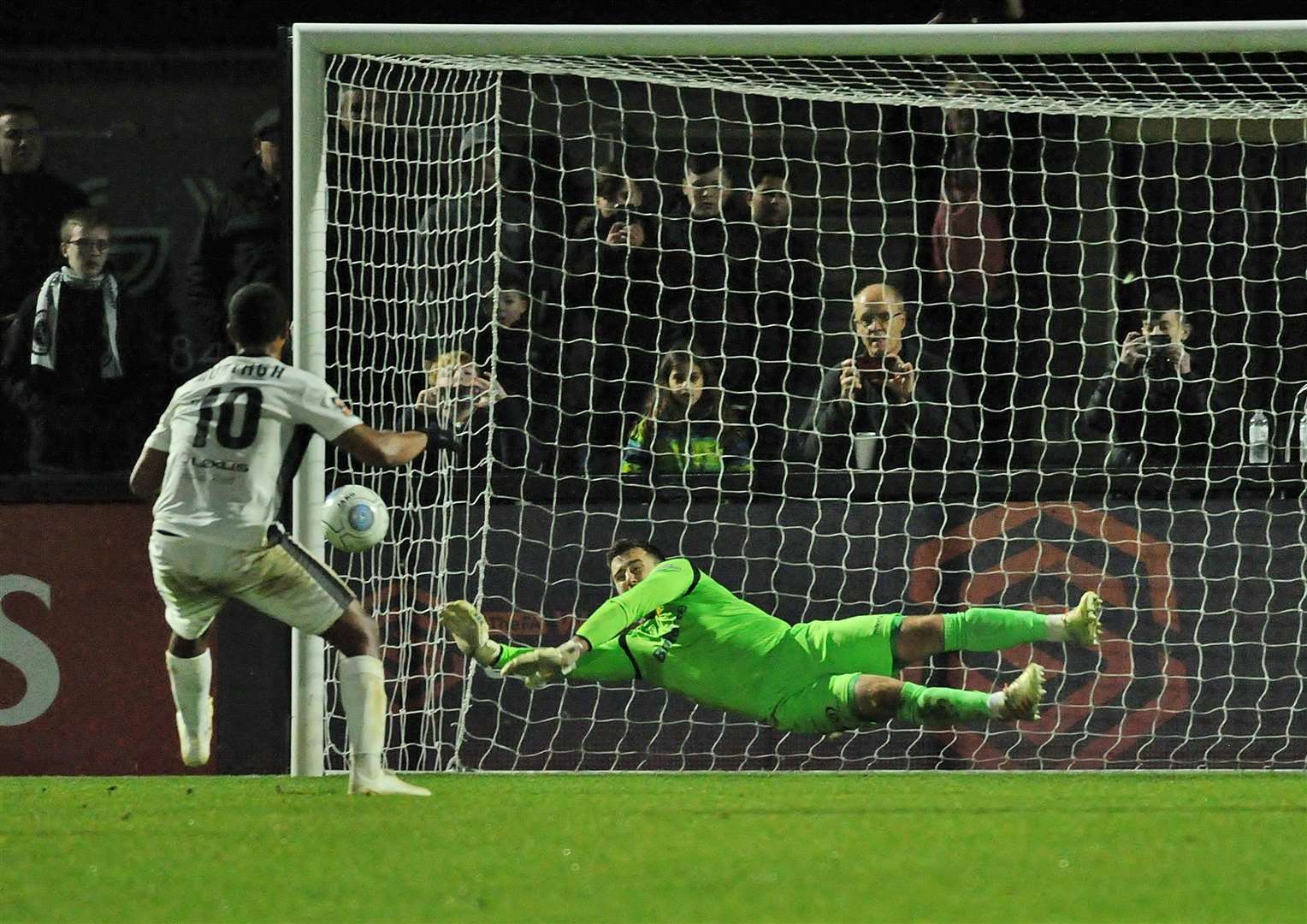 Ross Worner saves a Boreham Wood penalty last weekend Picture: Steve Terrell