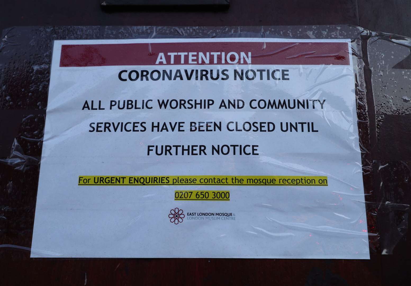 A sign on the door of the East London Mosque (Yui Mok/PA)