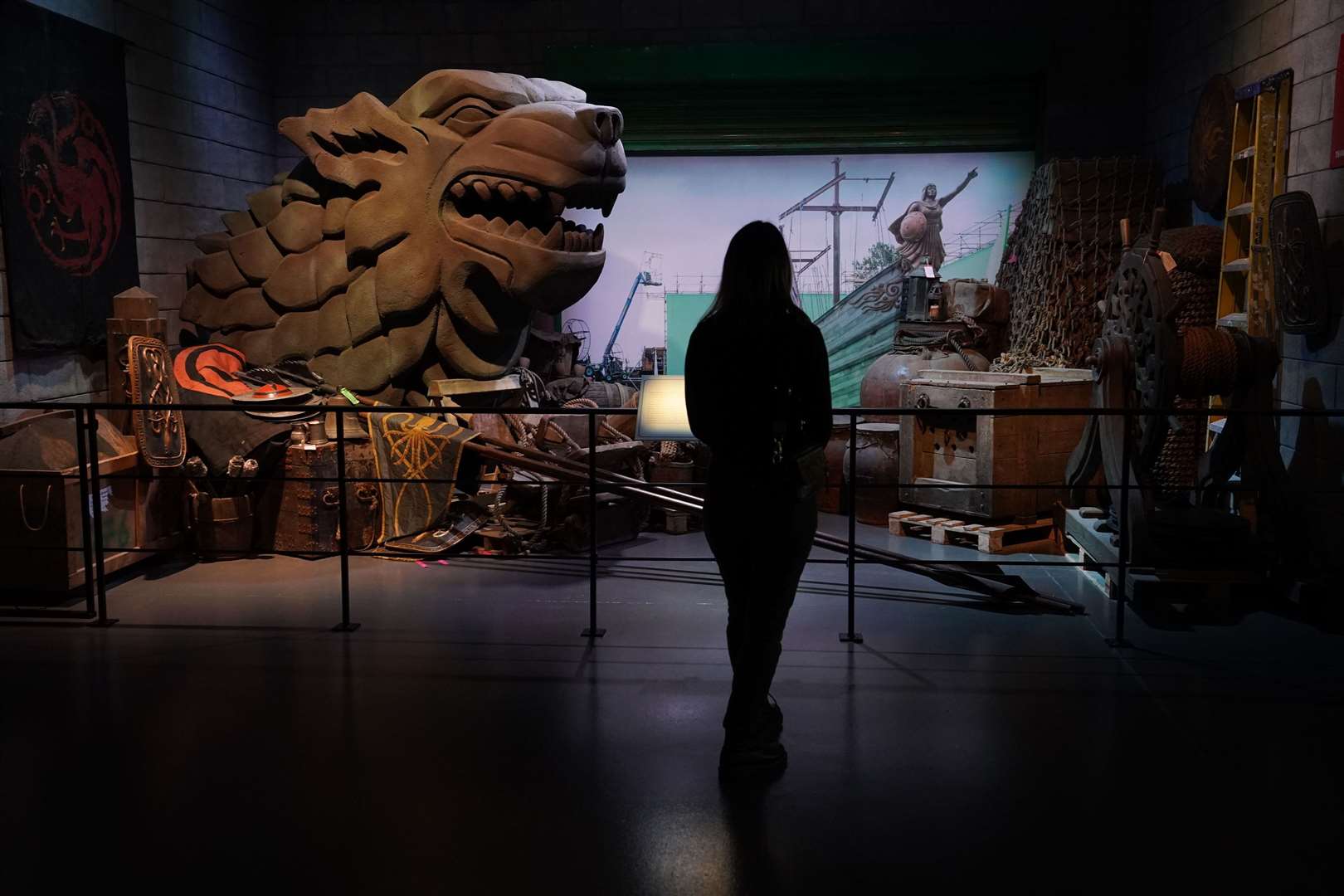 A visitor looks at props from the show (Niall Carson/PA)