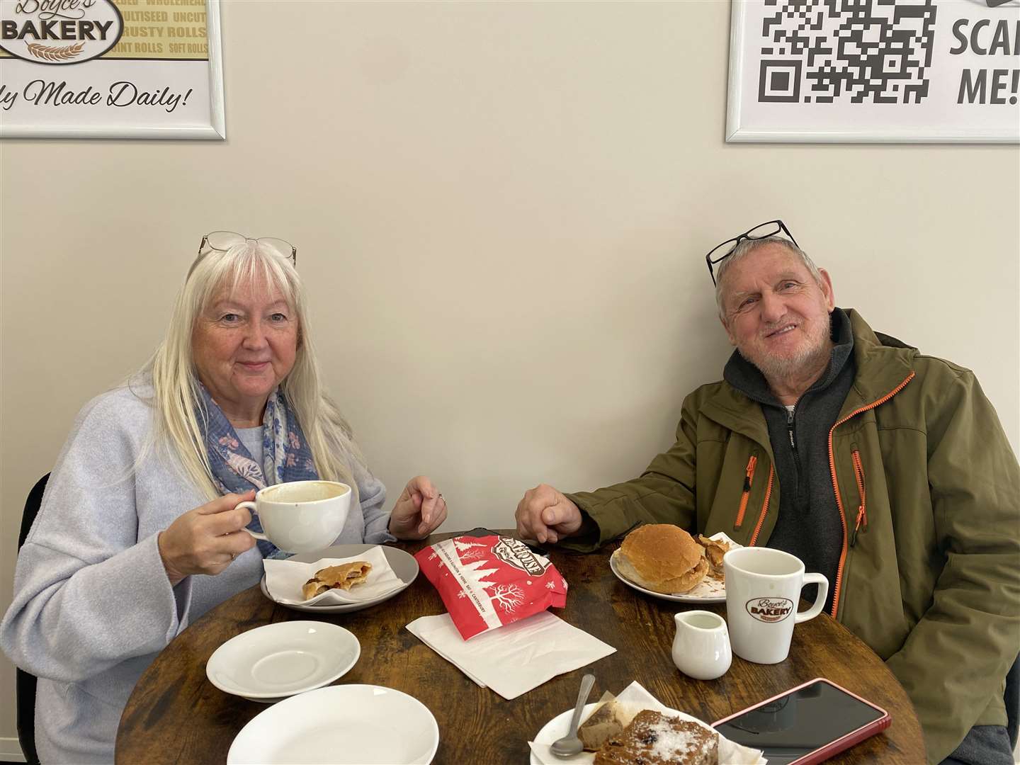 Jude and Albert Kendall enjoying their bakery delicacies