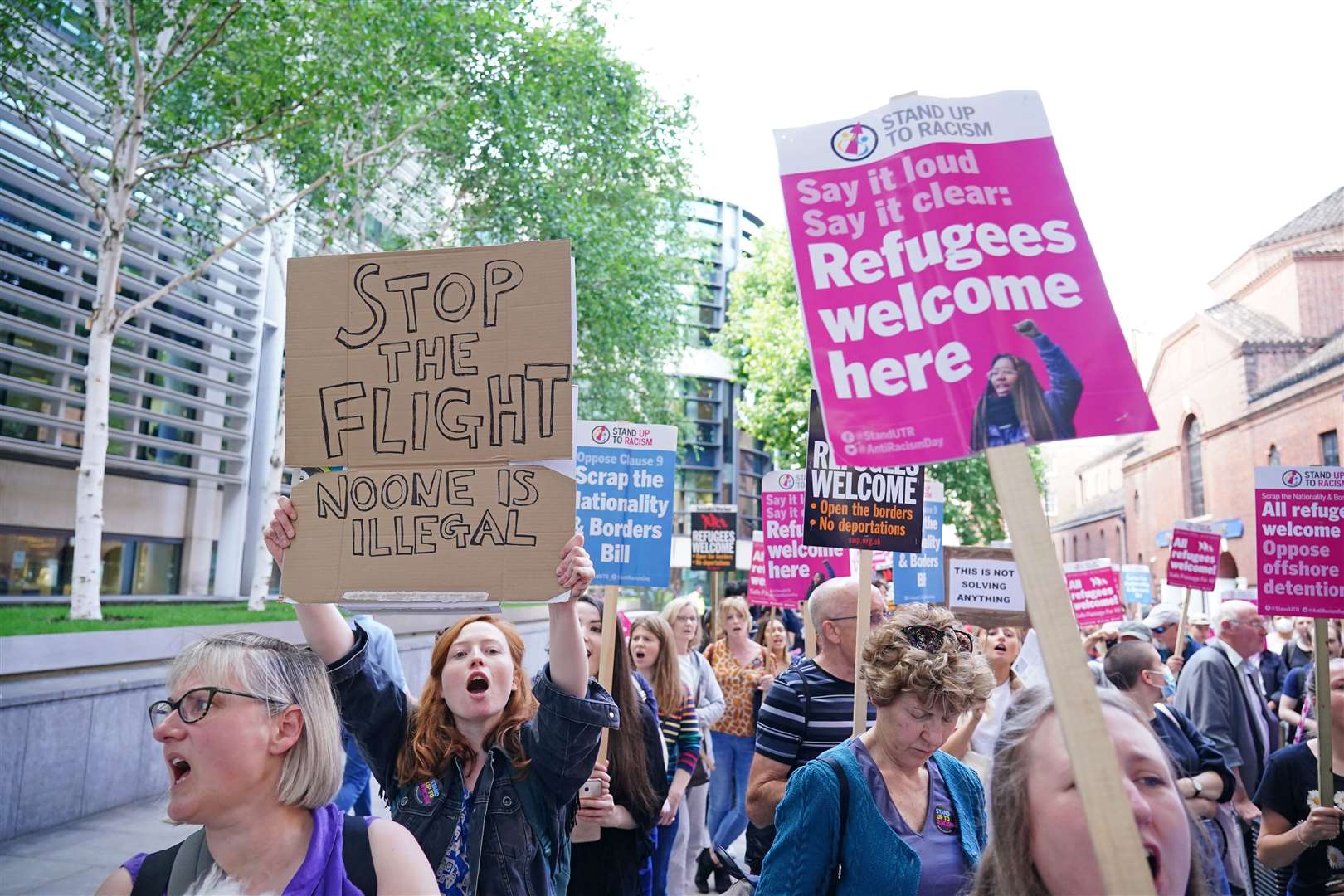 Demonstrators protest outside the Home Office against plans to send migrants to Rwanda (PA)