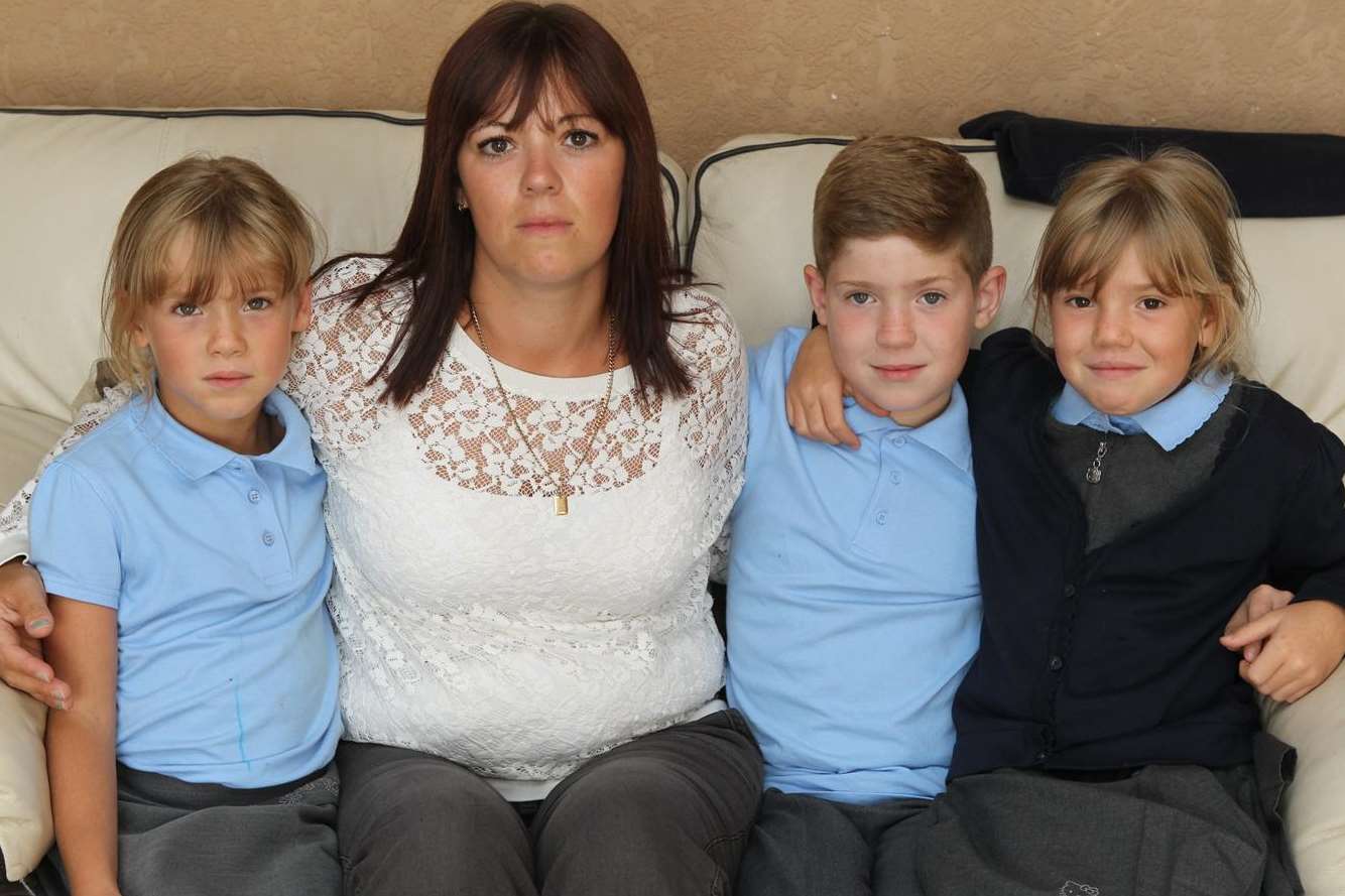 Leah Neat, seven, with her mother Sharon, brother Alex, 10, and twin sister Millie at their Gravesend home