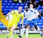 Gary Mulligan battles with former Gills Efe Sodje. Picture: Matthew Walker