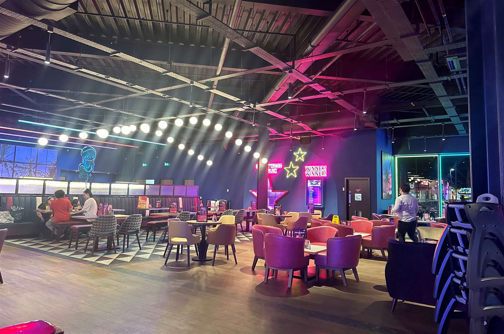 The seating and dining area at the shiny new bowling alley