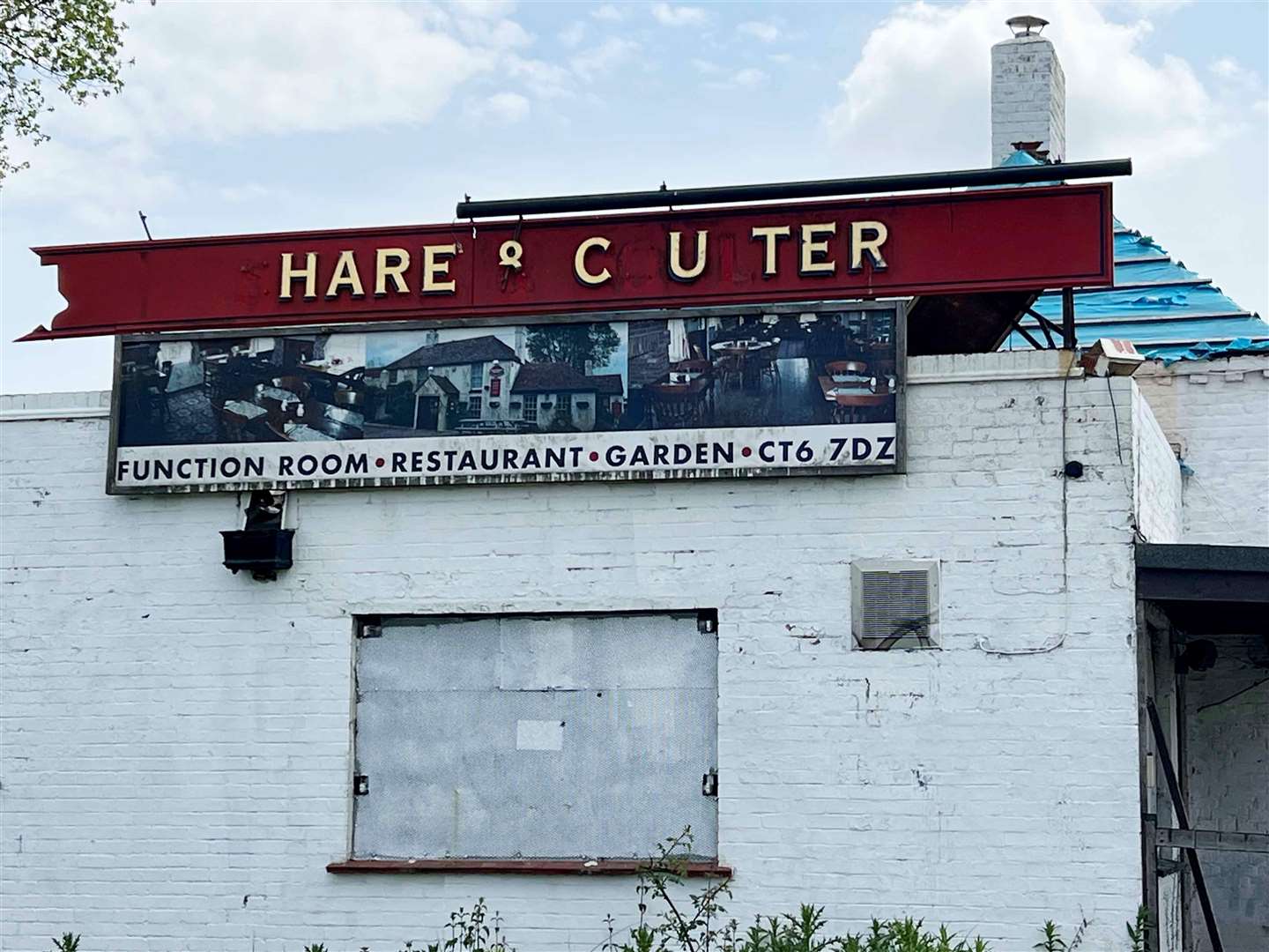 The once golden letters of the sign have been partially discarded. Picture: Barry Goodwin