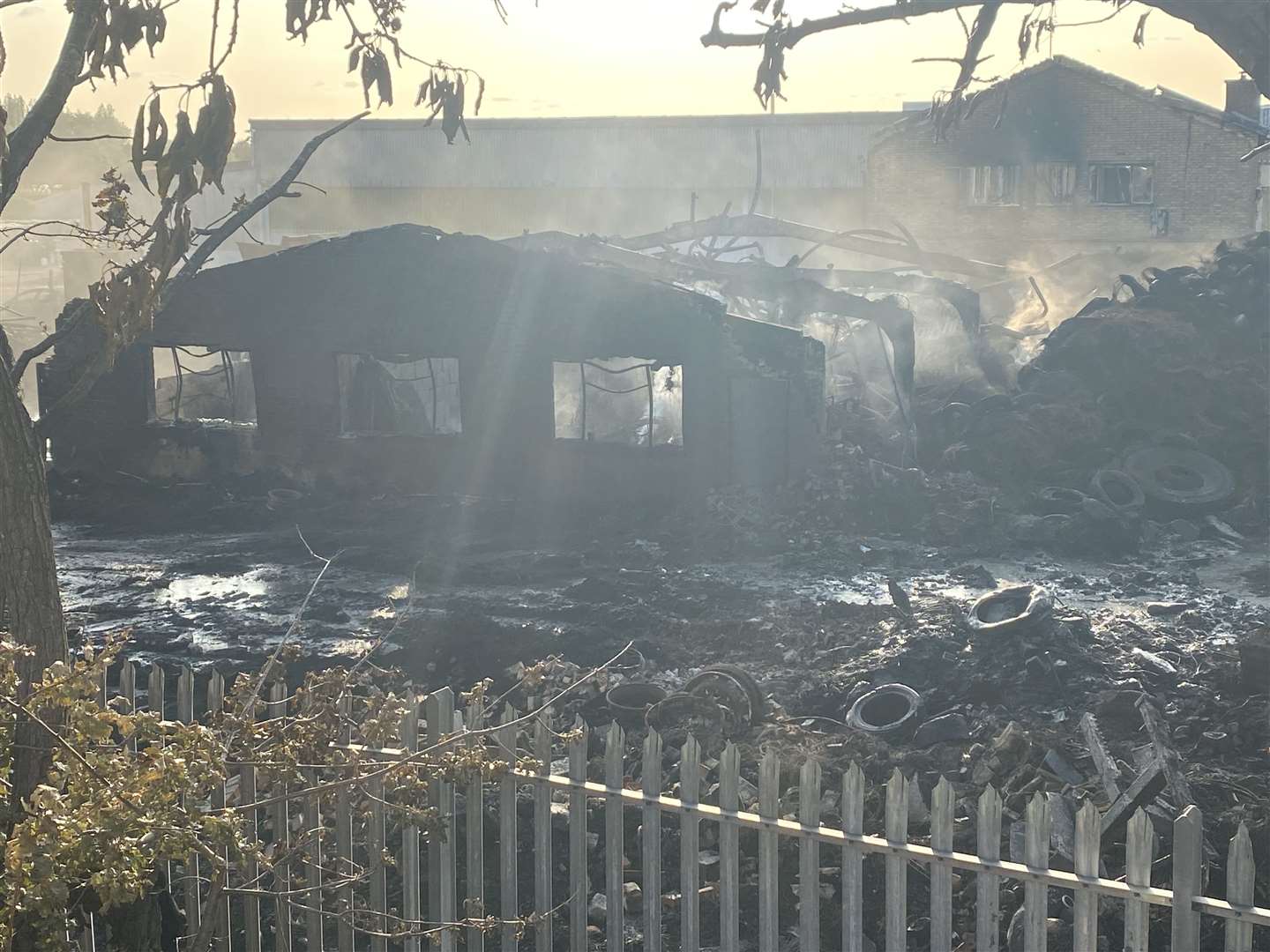 The nearby Biffa warehouse was also badly burnt. Picture: Steve Salter