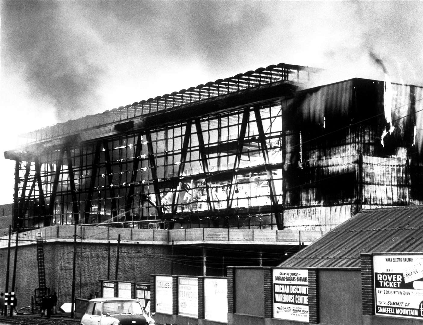 Flames in the skeleton of the Summerland entertainment centre in Douglas, Isle of Man, during the blaze in which 50 people were killed (PA)