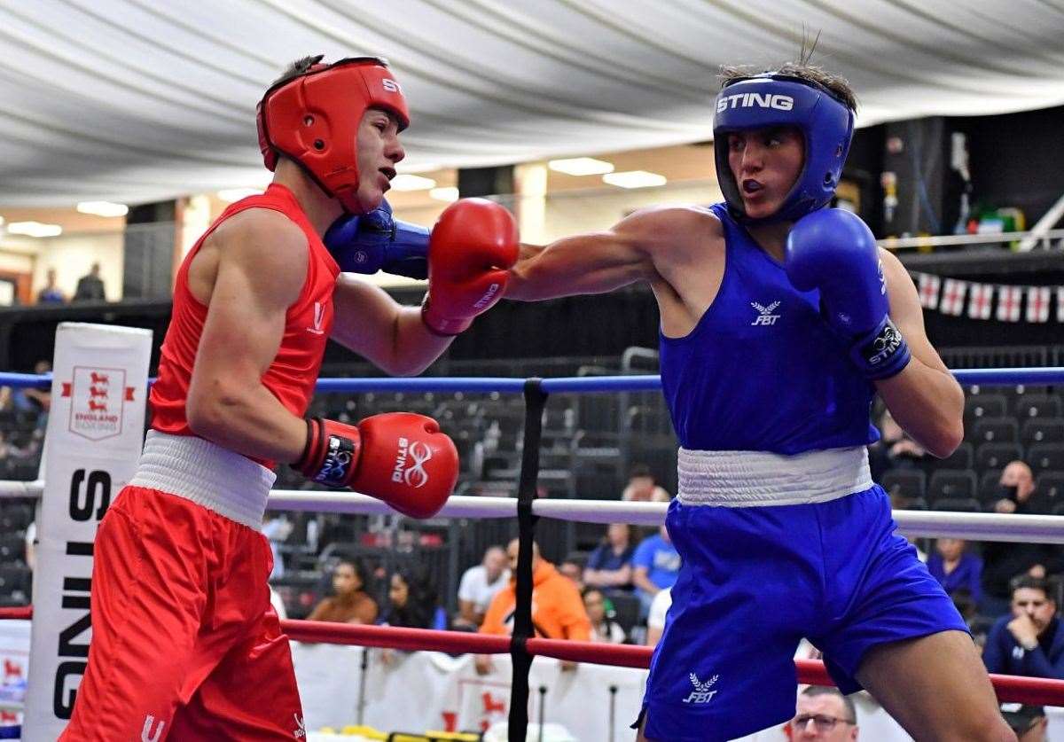 Westree boxer Jimmy Dean Wood, blue, on his way to Tri Nations gold