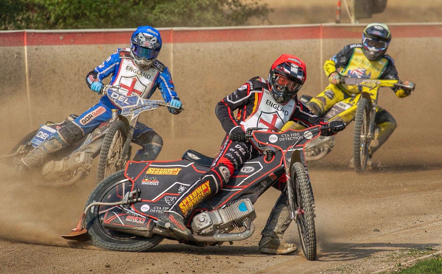 England’s Ben Morley (red helmet) and Rhys Naylor (blue) leading Aussie skipper Dayle Wood. Picture: Niall Strudwick