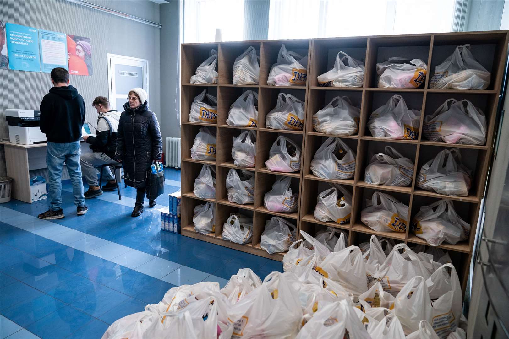 Bags containing humanitarian aid at the Depaul International Day Centre in Kyiv (Aaron Chown/PA)