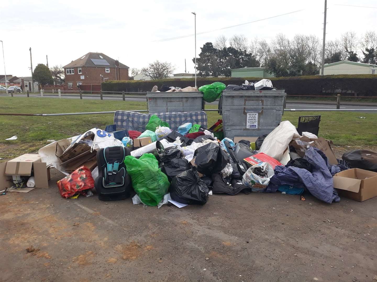 Fly-tipped rubbish in the Ship On Shore car park, Sheerness. The area is for beach waste only