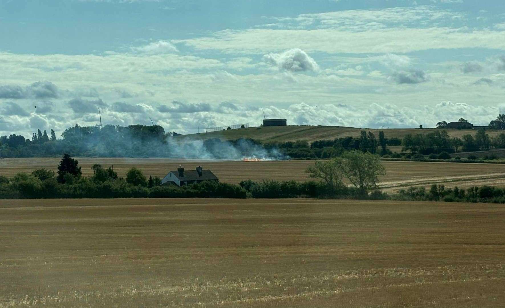 The field off Church Road, Eastchurch, on fire