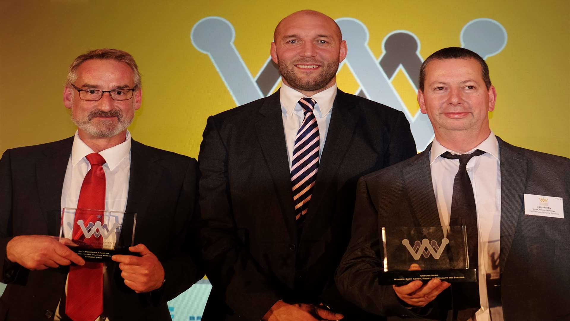 From left, health and safety advisor Richard Heffernan with ex-England rugby player Ben Kay and senior process technician Gary Ashby