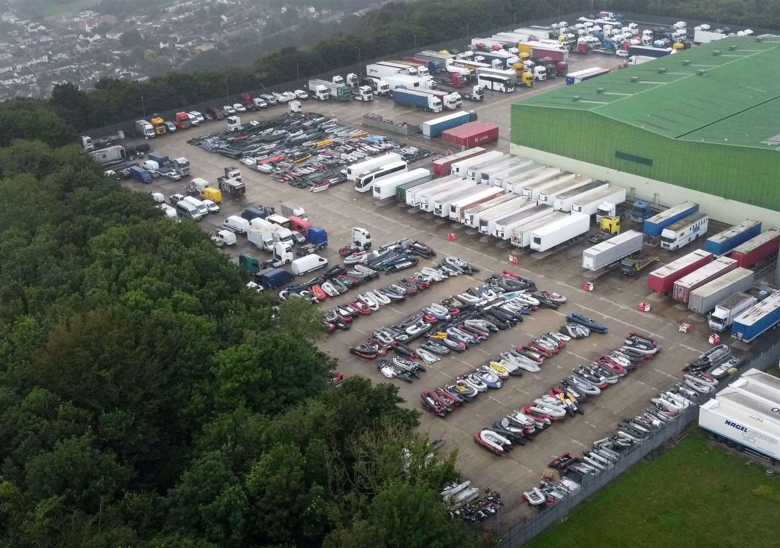 Boats used to cross the English Channel by people thought to be migrants are stored at a facility in Dover, Kent (Gareth Fuller/PA)