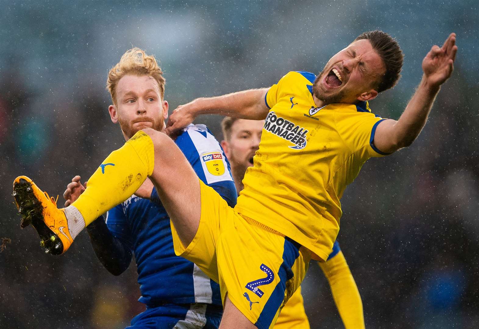 AFC Wimbledon defender Luke O'Neill fortunate to avoid sending-off on ...