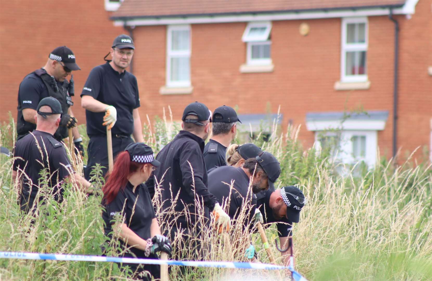 Police carrying out a search in Sittingbourne after a teenage girl was stabbed. Picture: John Nurden