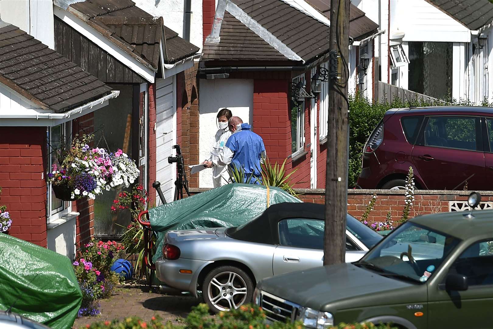 Forensic officers in Meadow Close on the day of Dalian Atkinson’s death (Joe Giddens/PA)