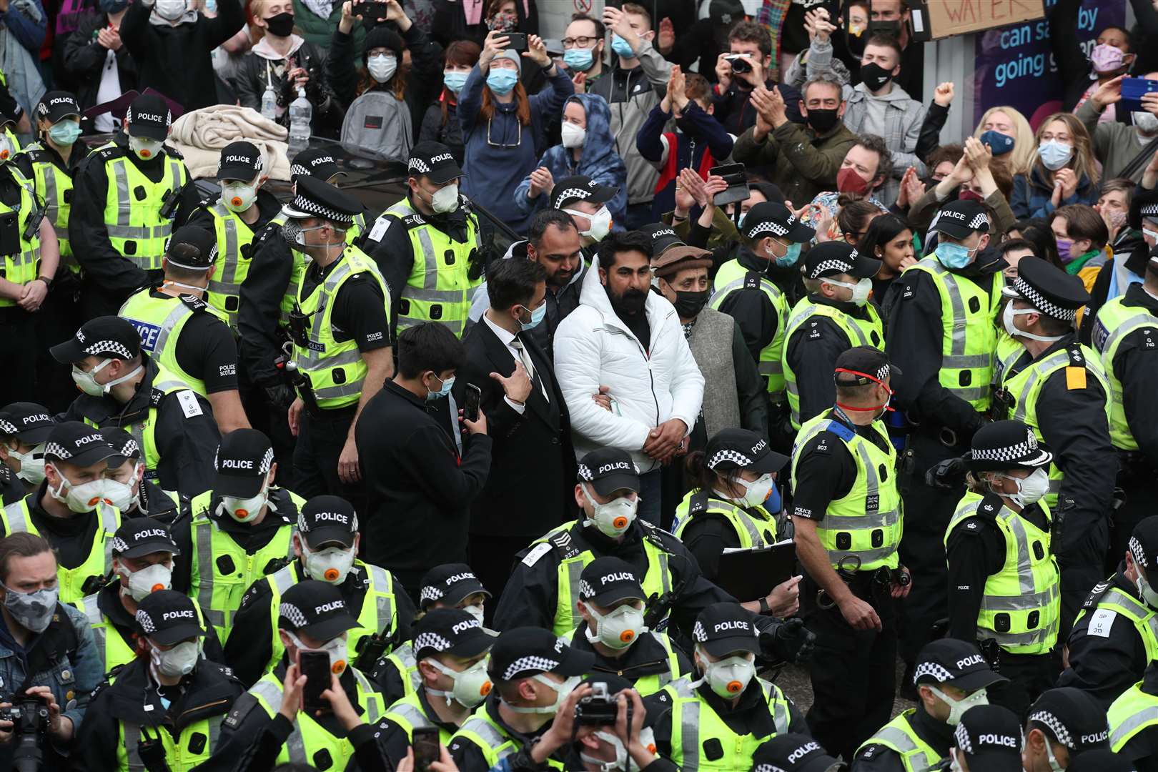 The two men were eventually released from the immigration enforcement van after several hours (Andrew Milligan/PA)