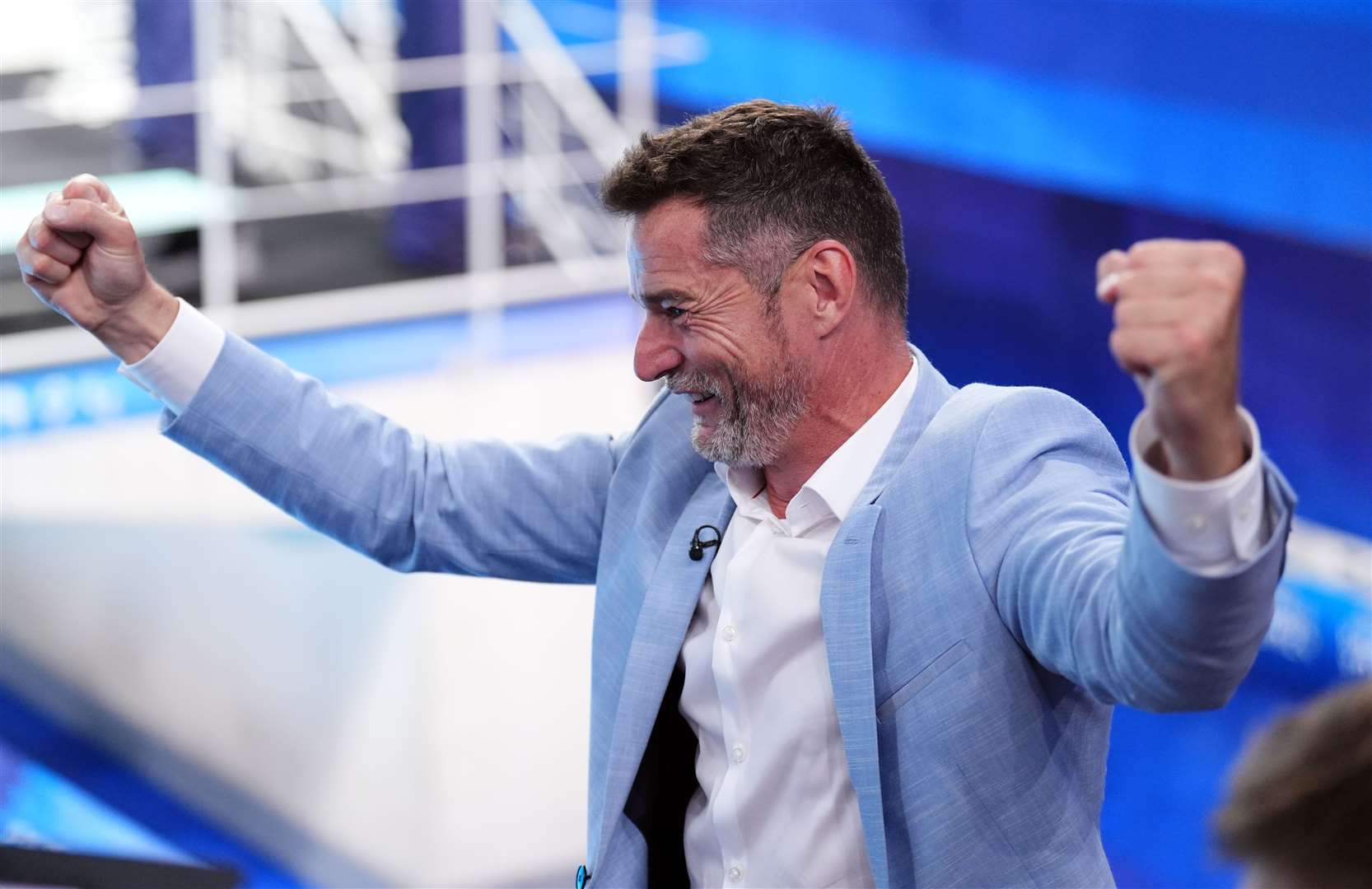 Fred Sirieix, father of Great Britain’s Andrea Spendolini-Sirieix, celebrates as his daughter wins bronze in the 10m synchronised diving (John Walton/PA)