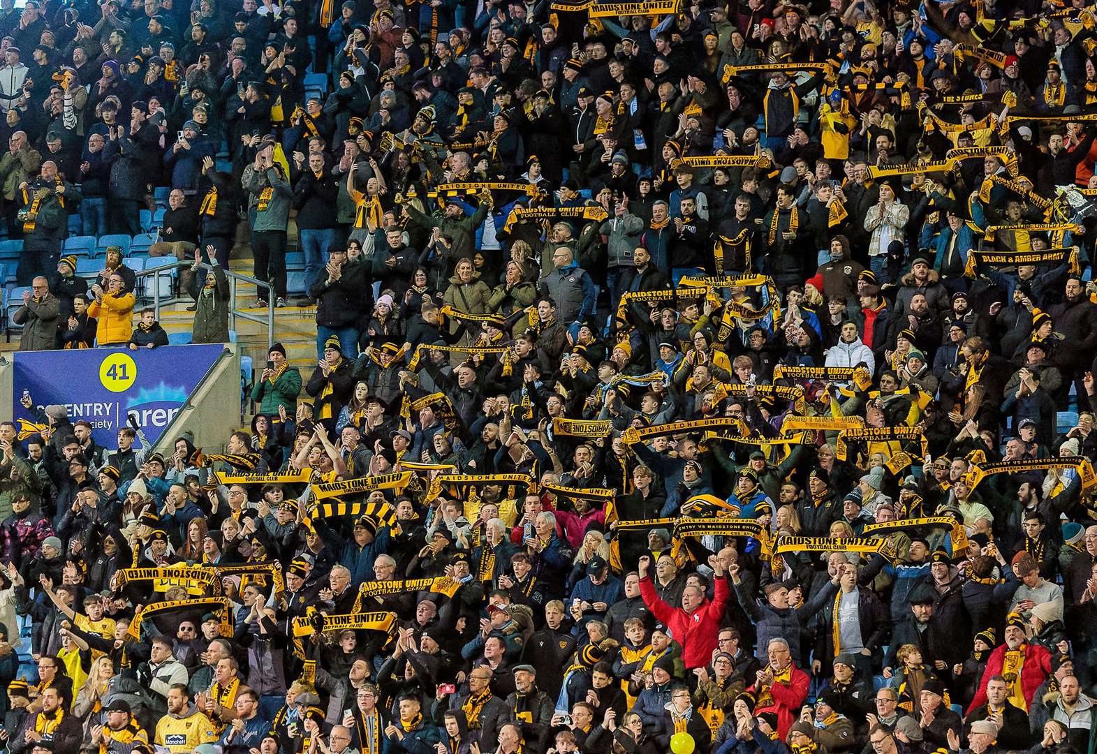 Maidstone fans at the full-time whistle. Picture: Helen Cooper