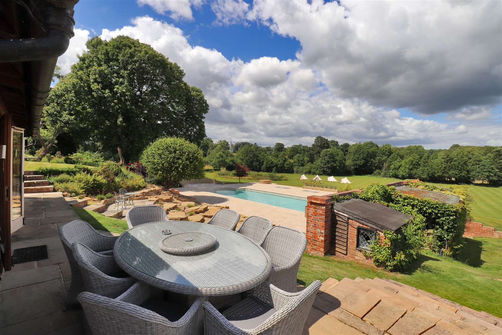 Cool off with a dip in the outdoor swimming pool. Picture: Savills