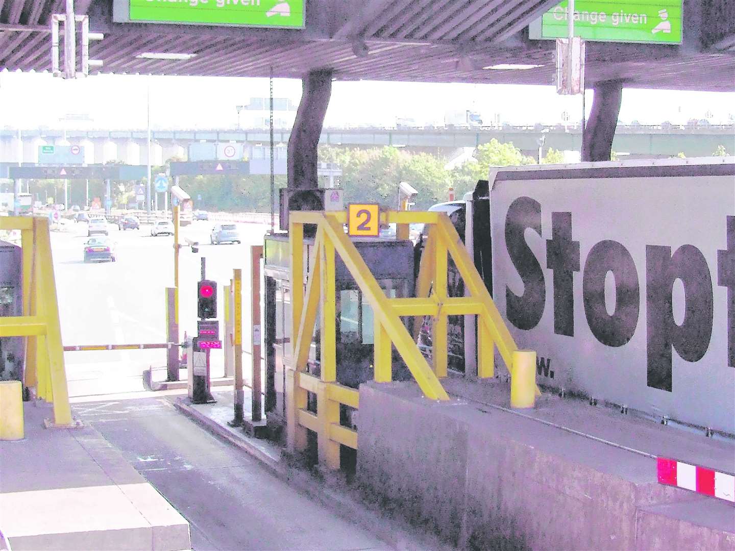 A toll station at the crossing prior to their removal five years ago