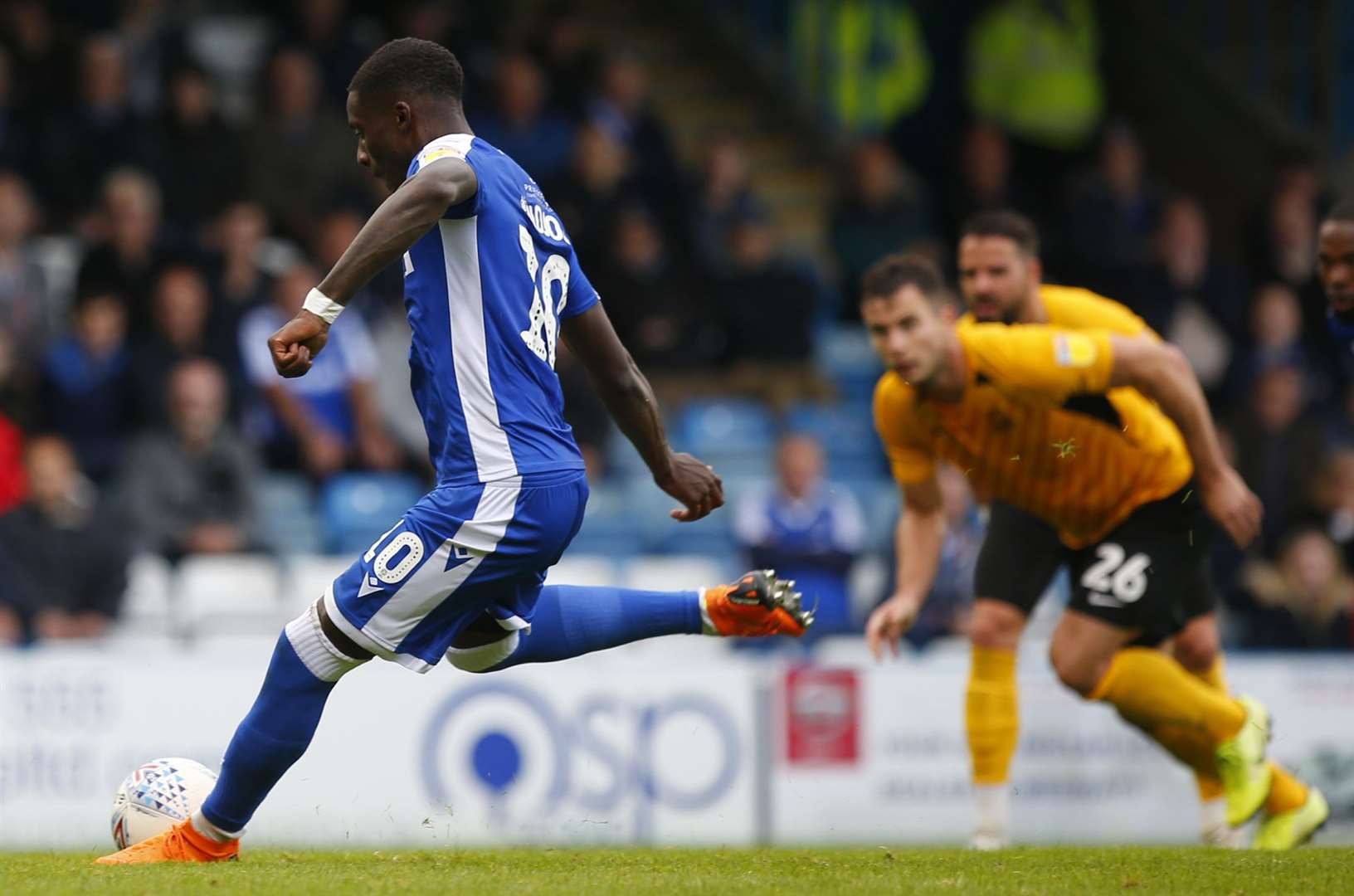 Gillingham's Mikael Ndjoli hits the outside of the upright with his first spot-kick. Picture: Andy Jones