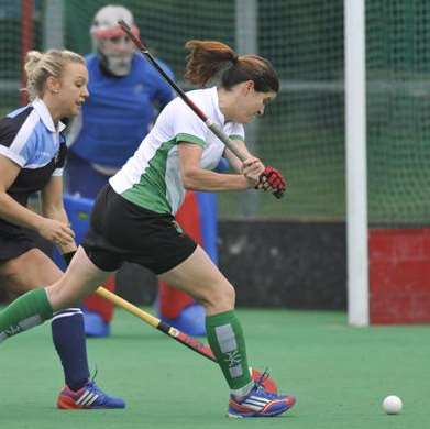 Player-coach Jen Wilson fires the ball goalward against Clifton