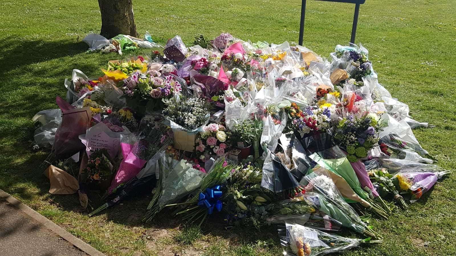 Flowers left for Julia in Aylesham village square, where a walk is taking place today