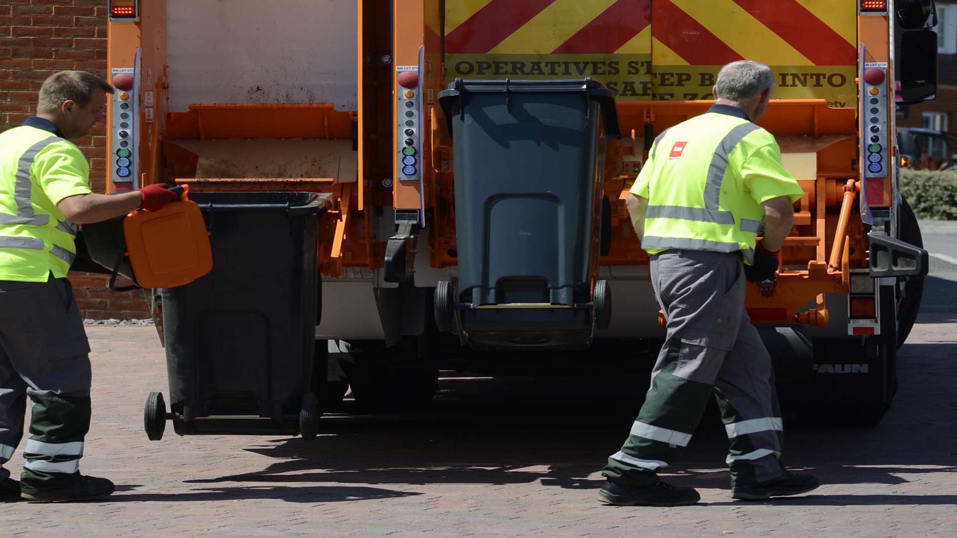 Binmen in action. Stock pic