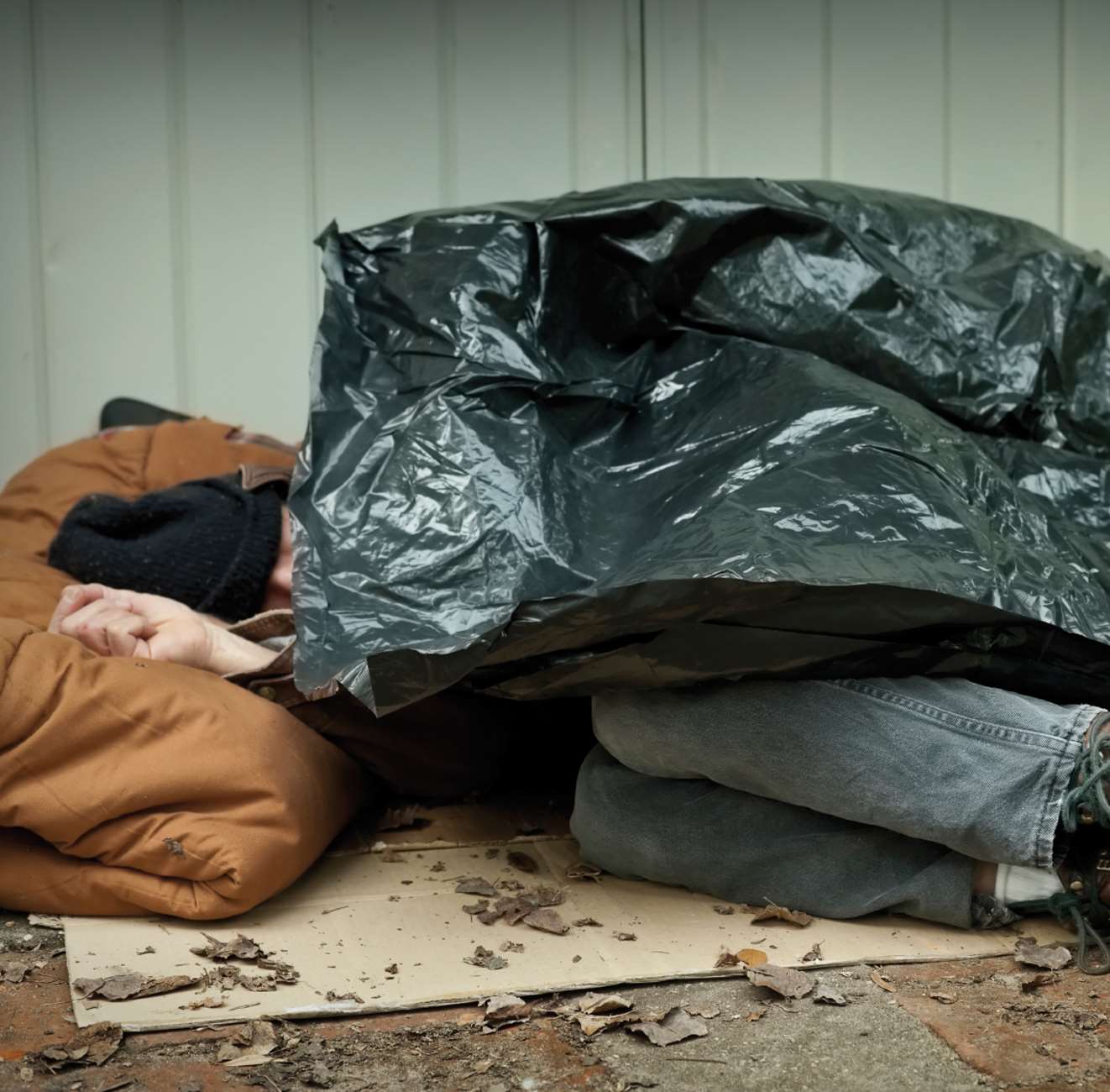 Homeless person living on street. Stock pic.