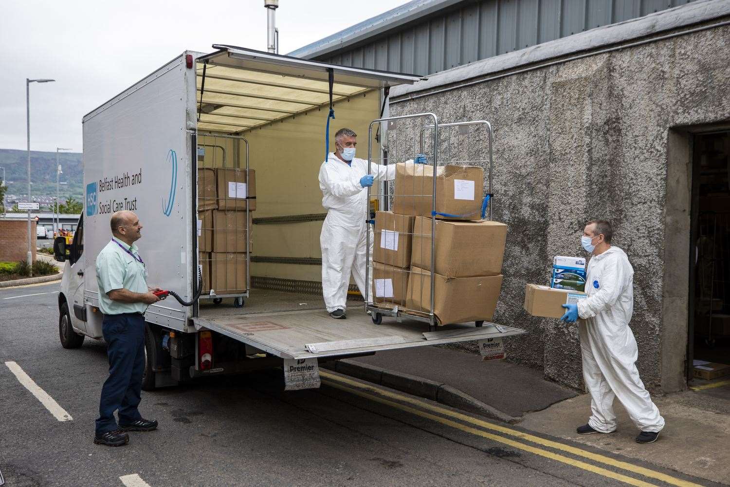 A PPE order is loaded onto a lorry outside the Belfast Trust’s central store (Liam McBurney/PA)