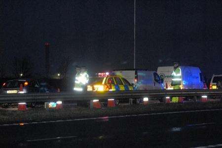 Police on the Sheppey Crossing following the accident