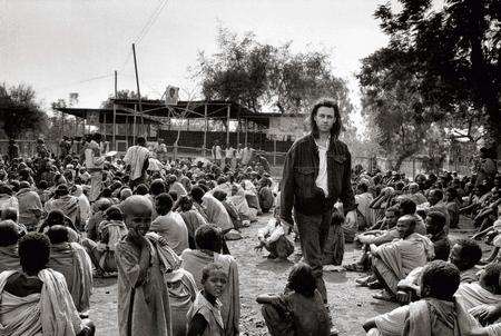 Bob Geldof visiting refugee feeding centre in Ethiopia, 1987 by Brian Aris