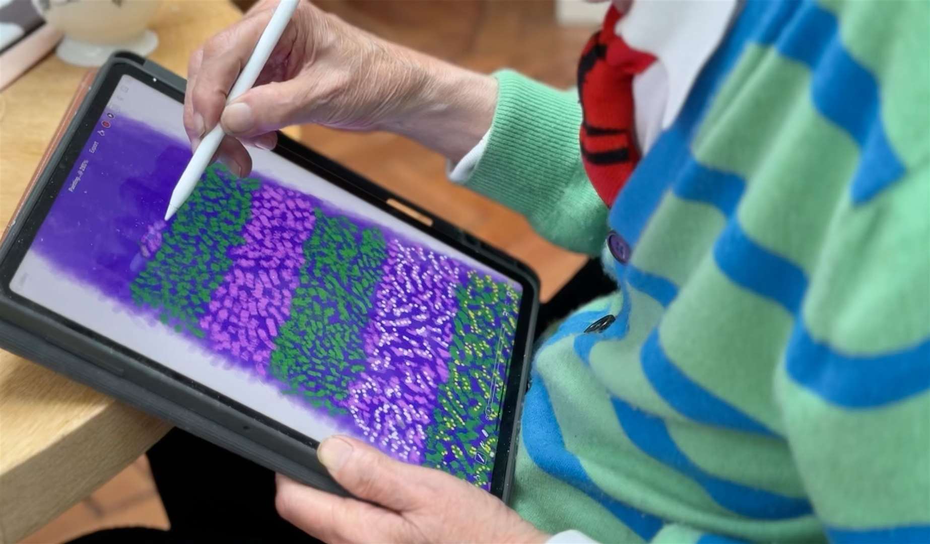 David Hockney created a purple and green Christmas tree to be displayed on Battersea Power Station (Jonathan Wilkinson/PA)