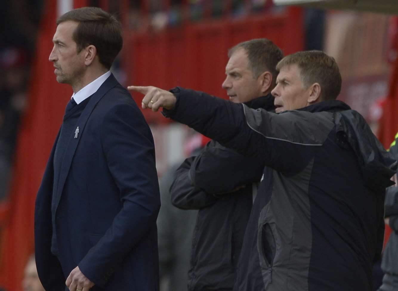 Gills manager Justin Edinburgh with assistant Andy Hessenthaler and coach Steve Lovell. Picture: Barry Goodwin