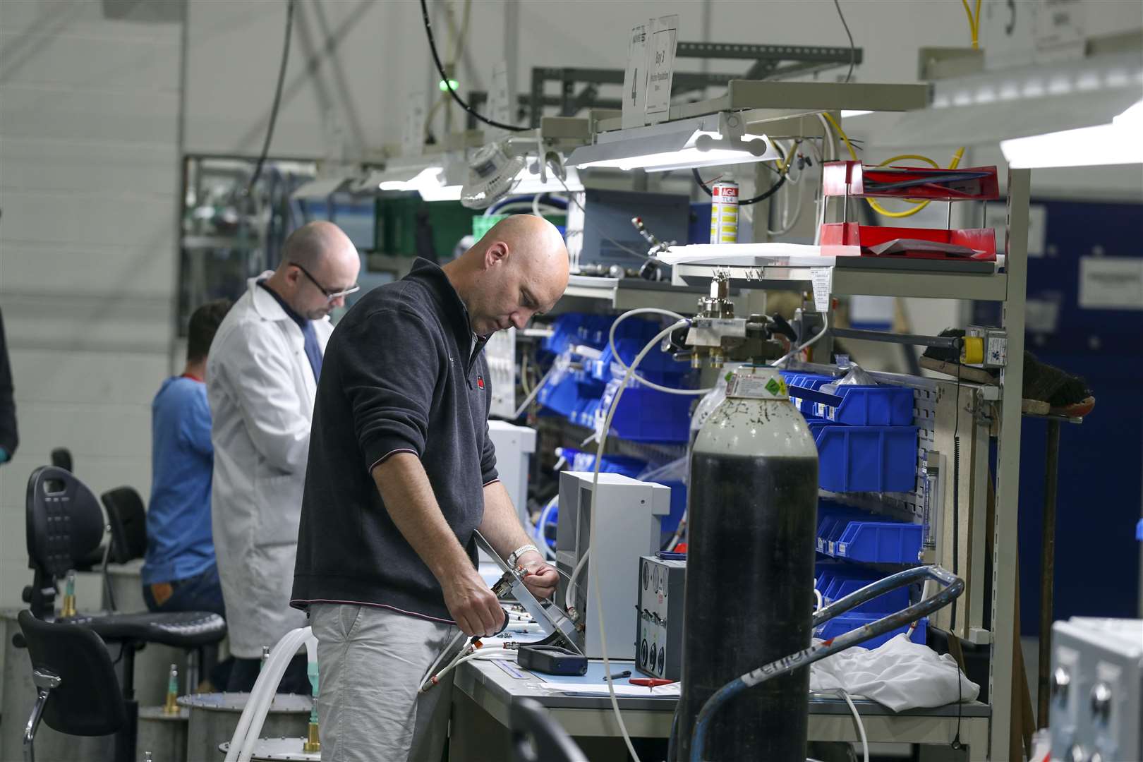 Staff at Penlon in Abingdon, Oxfordshire, test ventilators ahead of them being shipped out to the NHS (Steve Parsons/PA)