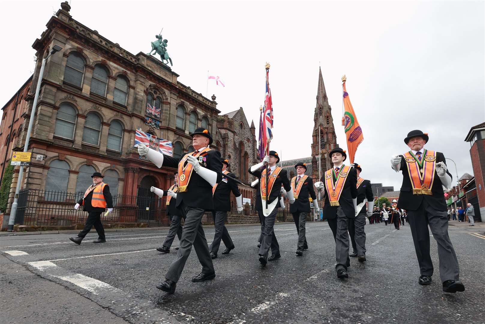 Members of the Orange Order take part in a Twelfth of July parade in Belfast in 2023 (PA)