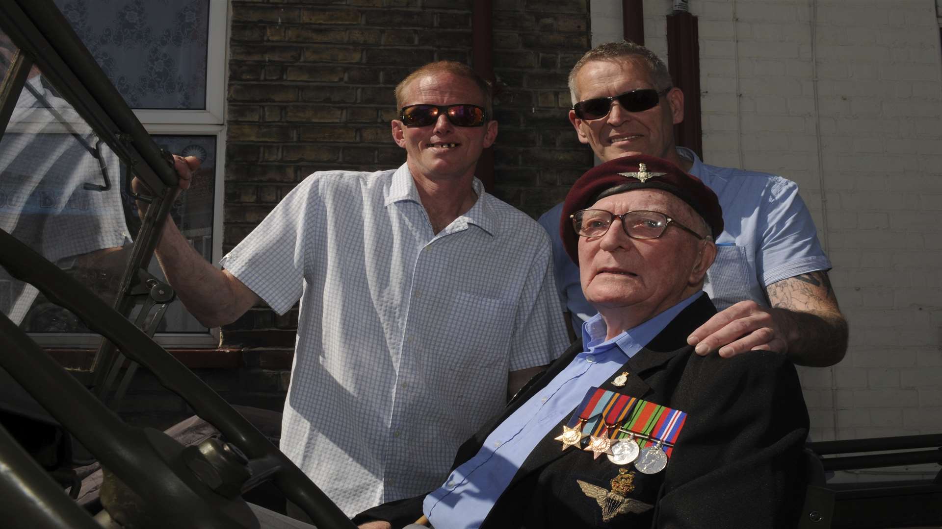Mr Richards on his 90th birthday with sons Gary and Roy