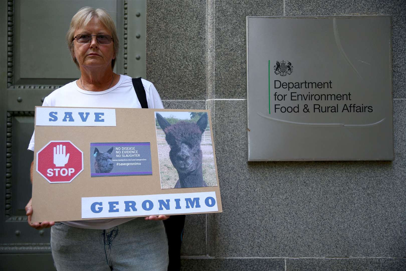 Demonstrators outside Defra headquarters in central London during a protest march (Hollie Adams/PA)