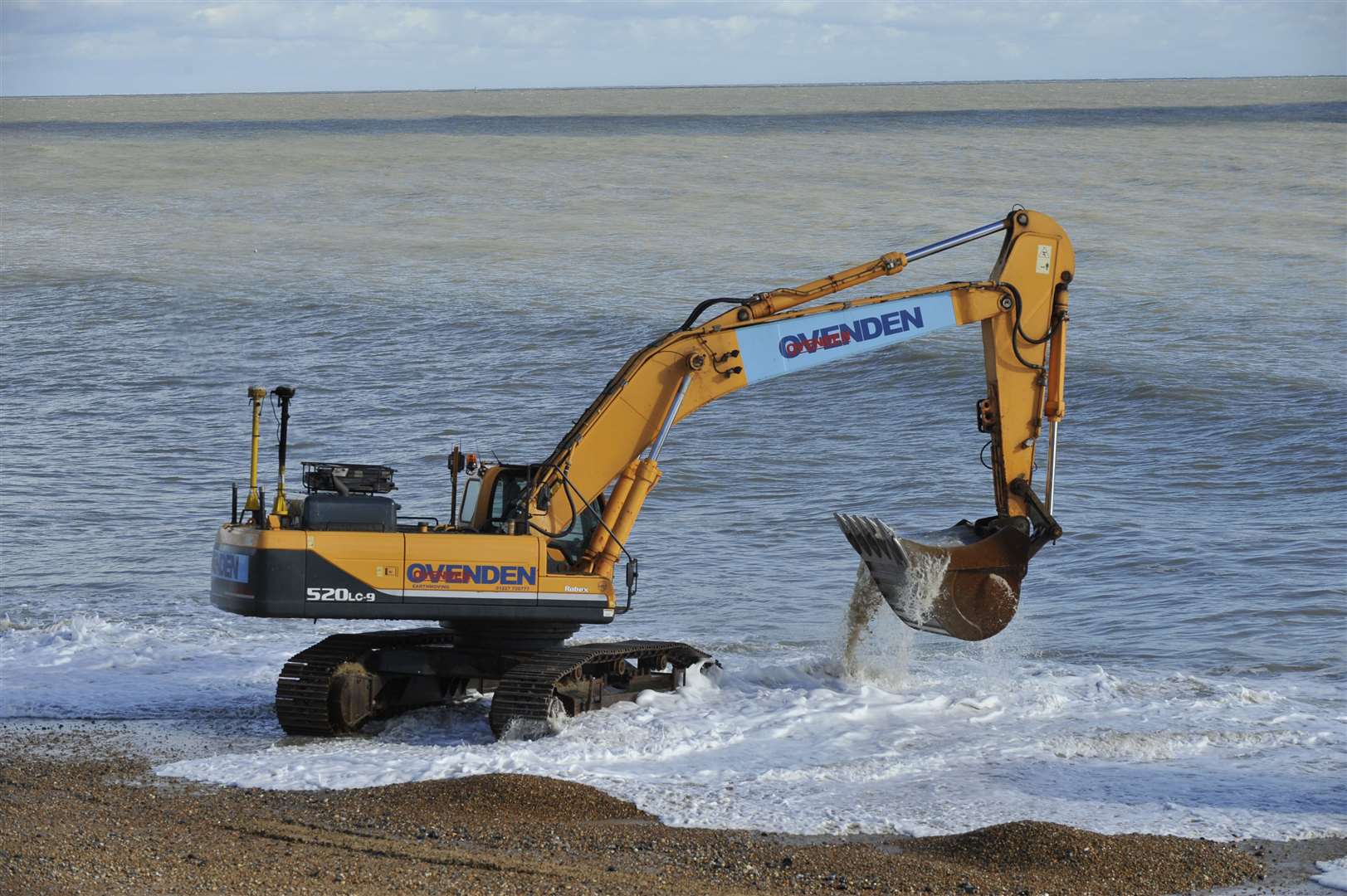 A digger carrying out work on Deal beach in 2013. Picture: Tony Flashman