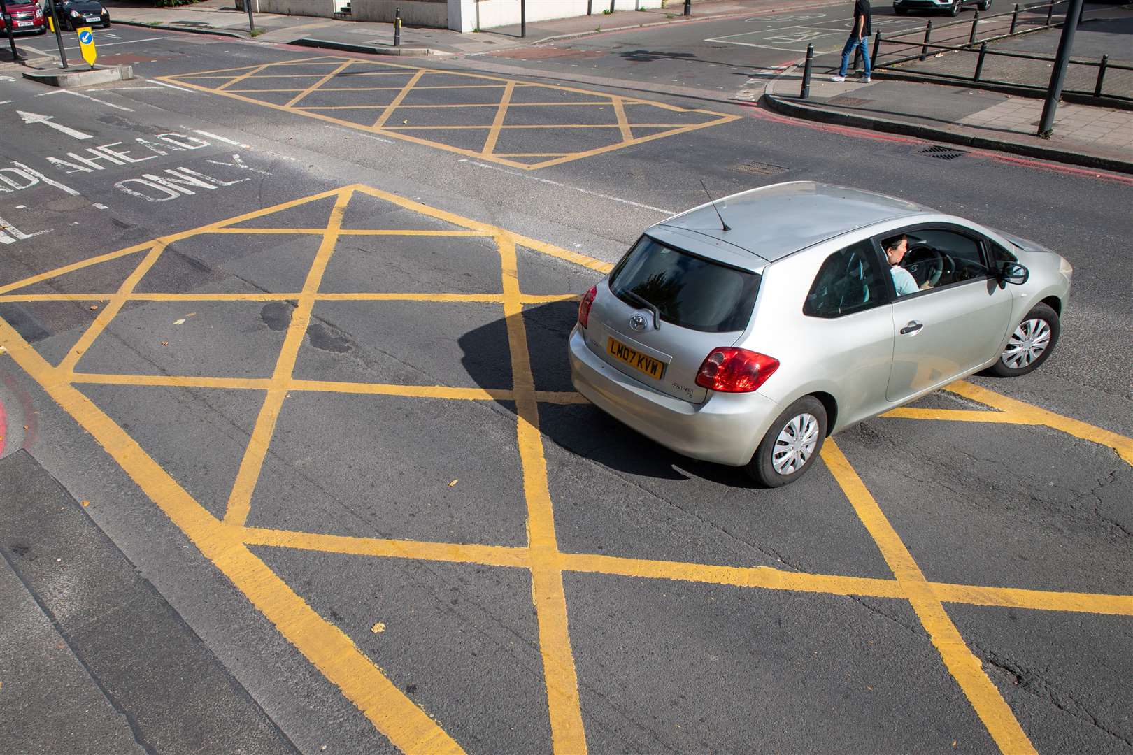 Local authorities in London and Cardiff raked in nearly £60m in just 12 months from drivers caught breaking road rules such as blocking yellow box junctions (Dominic Lipinski/PA)