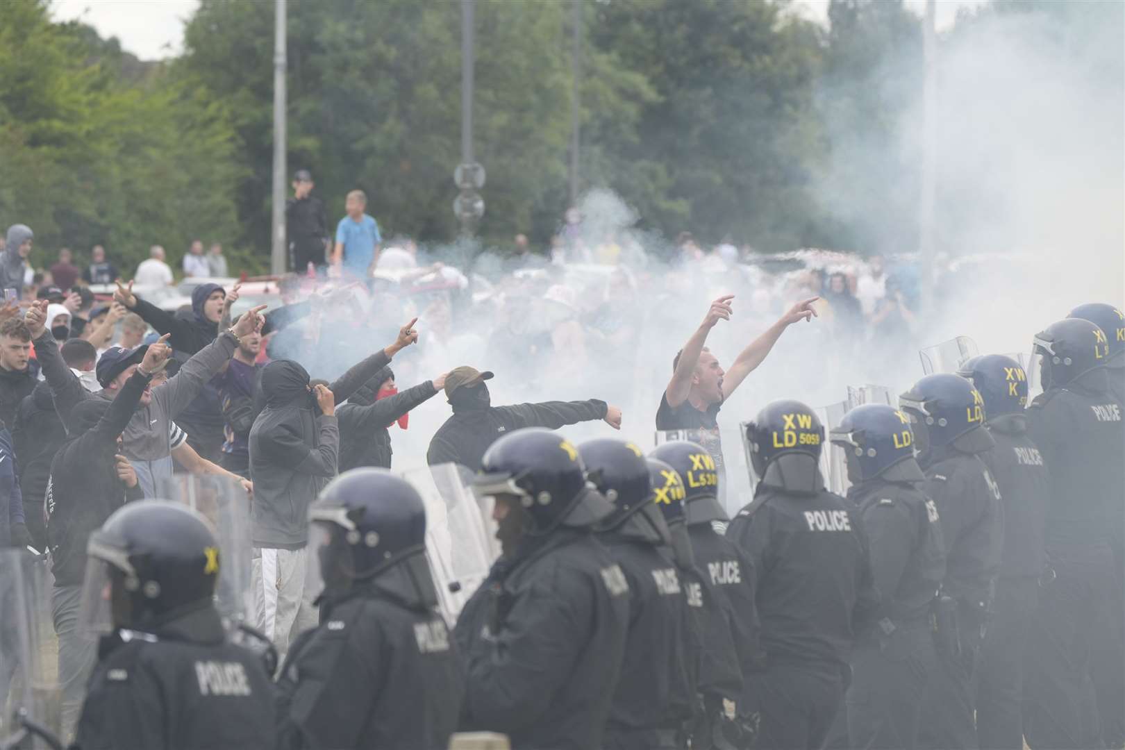 Anti-immigration protesters faced off against police near the Holiday Inn Express in Rotherham, South Yorkshire amid misplaced anger over the Southport attacks (Danny Lawson/PA)