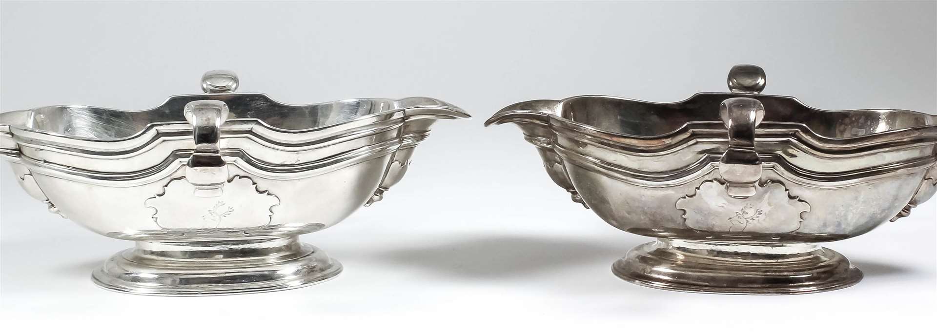 A pair of George I Irish silver sauce boats by Mathew Walker sold for £76,000