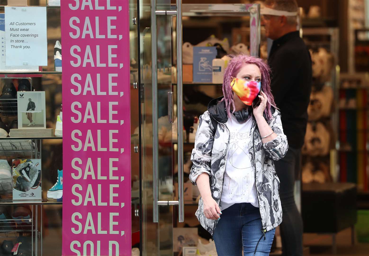 Face coverings are now mandatory in all shops and on public transport (Andrew Milligan/PA)