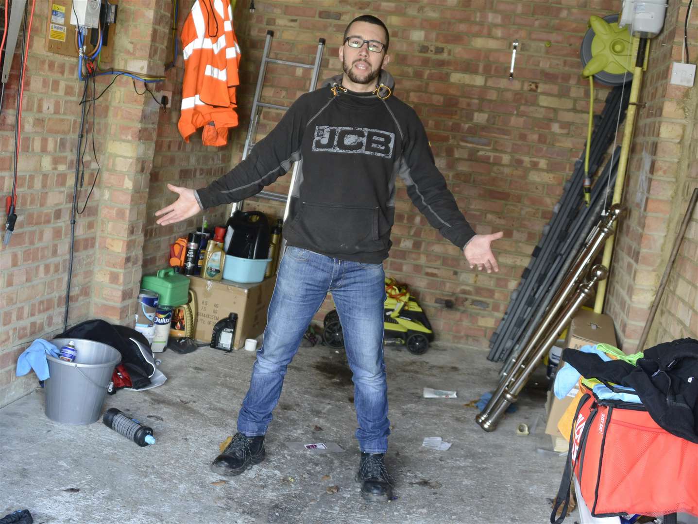 Motorcyclist Mauro Borges in the garage where the bikes were stolen