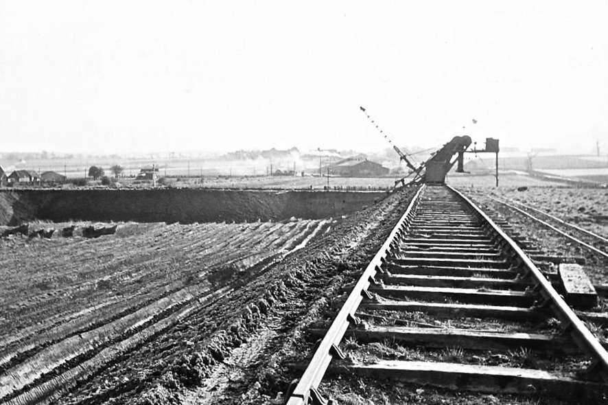 Taken on April 9, 1960, this picture shows the large buildings of Hammill Brickworks, behind the crane on the East Kent Light Railway track